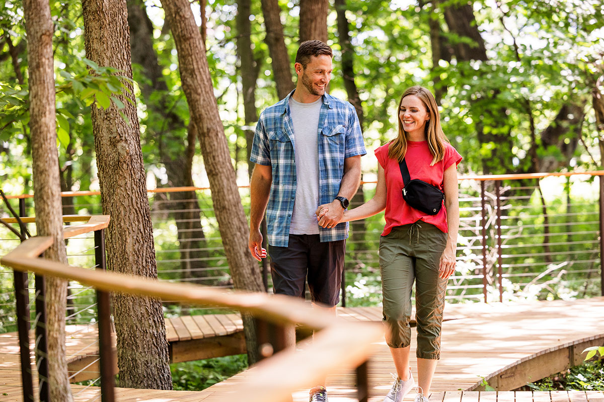 Couple Walking in the Woodland Grove