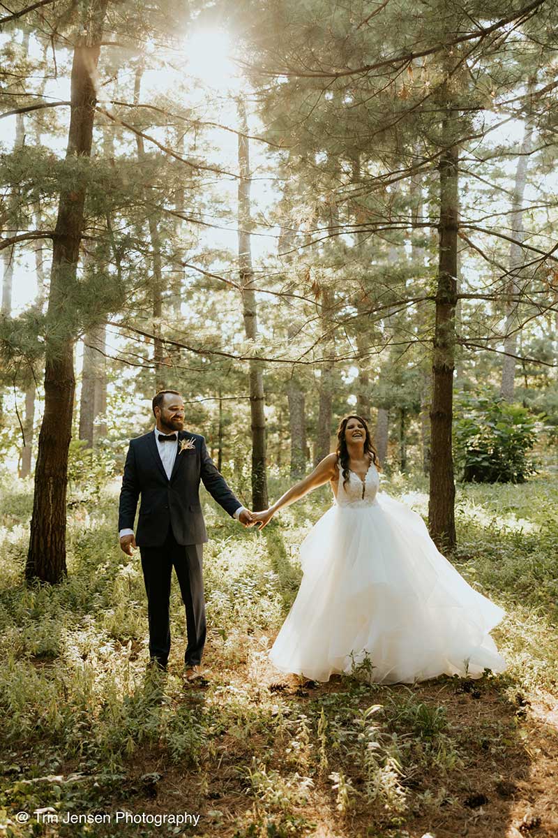 Newlyweds Pose in Arbor Lodge State Park's Forested Area