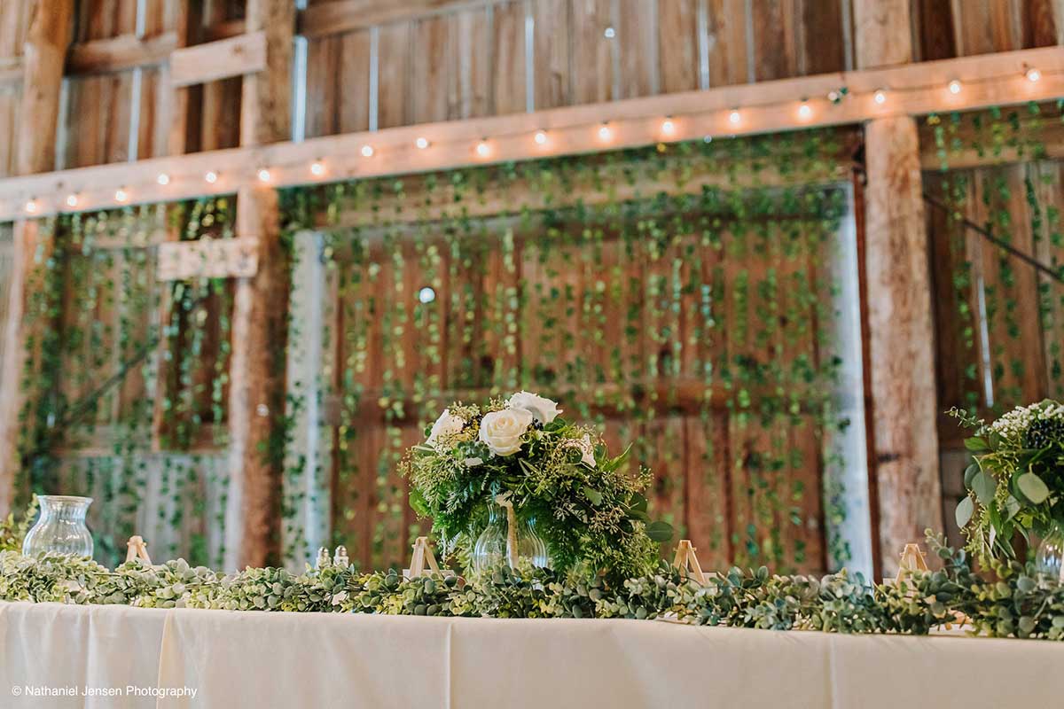 Simple Barn Wedding Details with Greenery