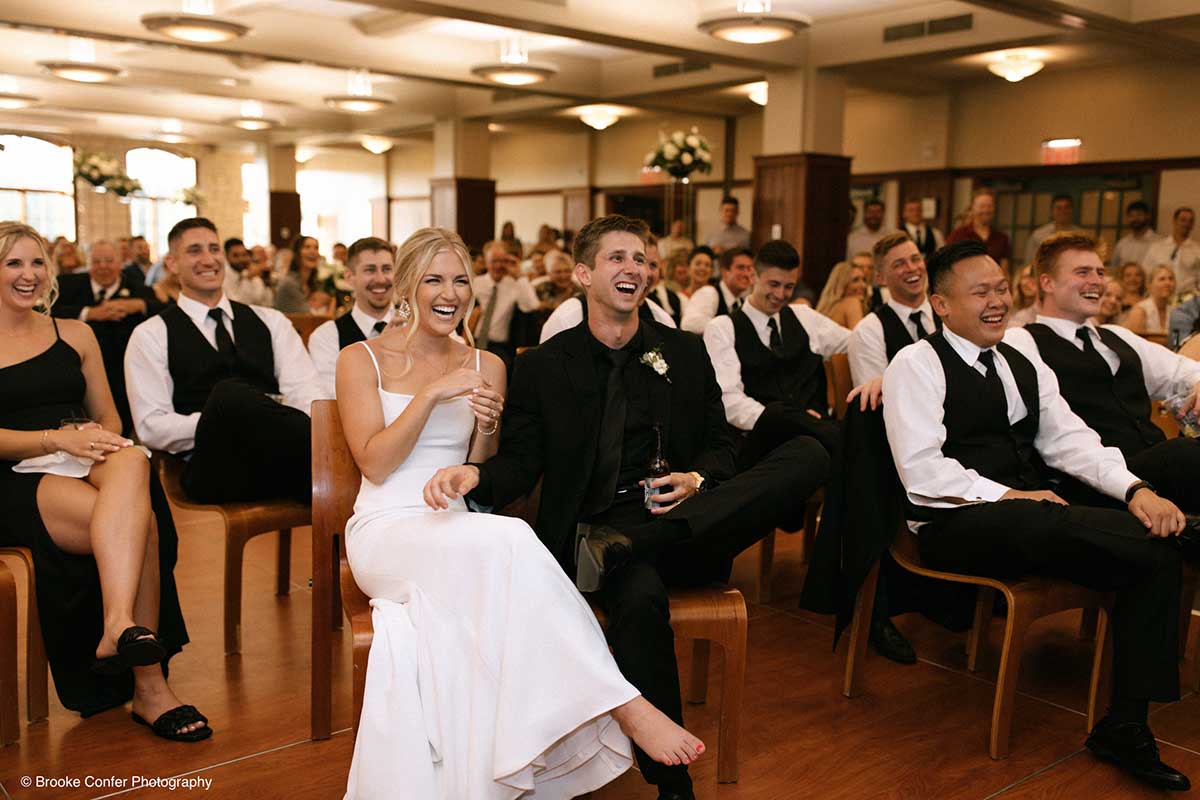 Wedding Guests React to Speeches Inside Lied Lodge