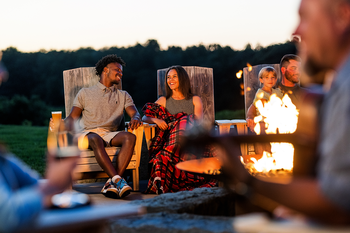 Group Around Firepit at Lied Lodge